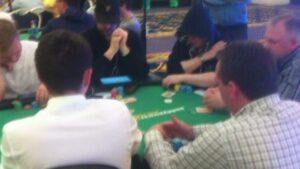 Tuomo takes chips from Hellmuth
